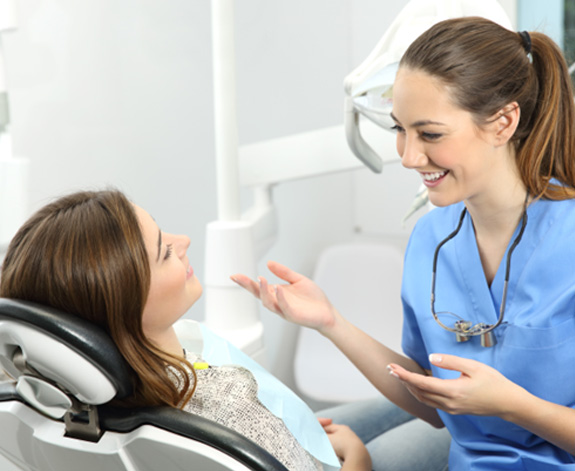 Patient talking to a dentist