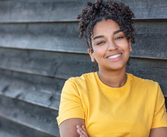 Smiling young woman with beautiful teeth