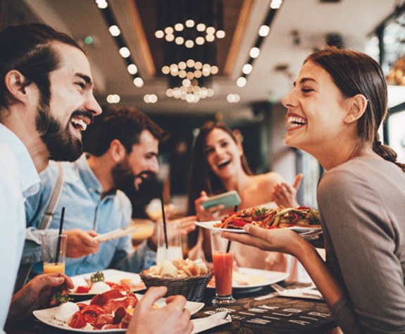 group of friends eating together in Raleigh 