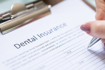 Close up of a dental insurance form on a clipboard