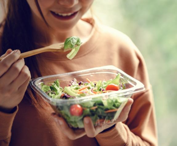 Woman eating healthy in Raleigh 