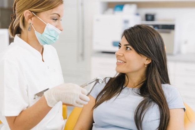 patient visiting dentist for tooth-colored filling